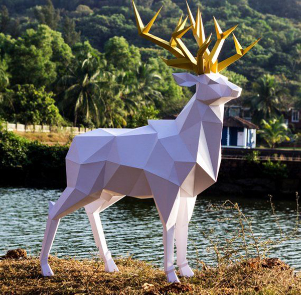 Fiberglass deer sculpture white color