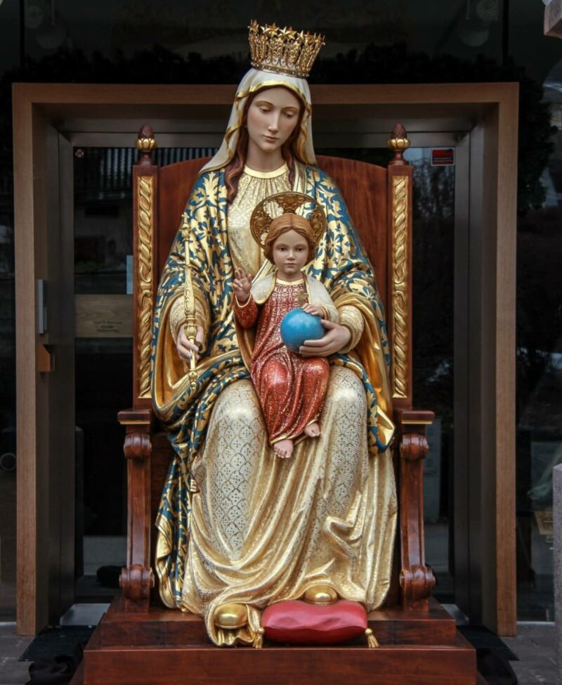 Sitting in a chair with the virgin of Jesus fiberglass religious statue ...