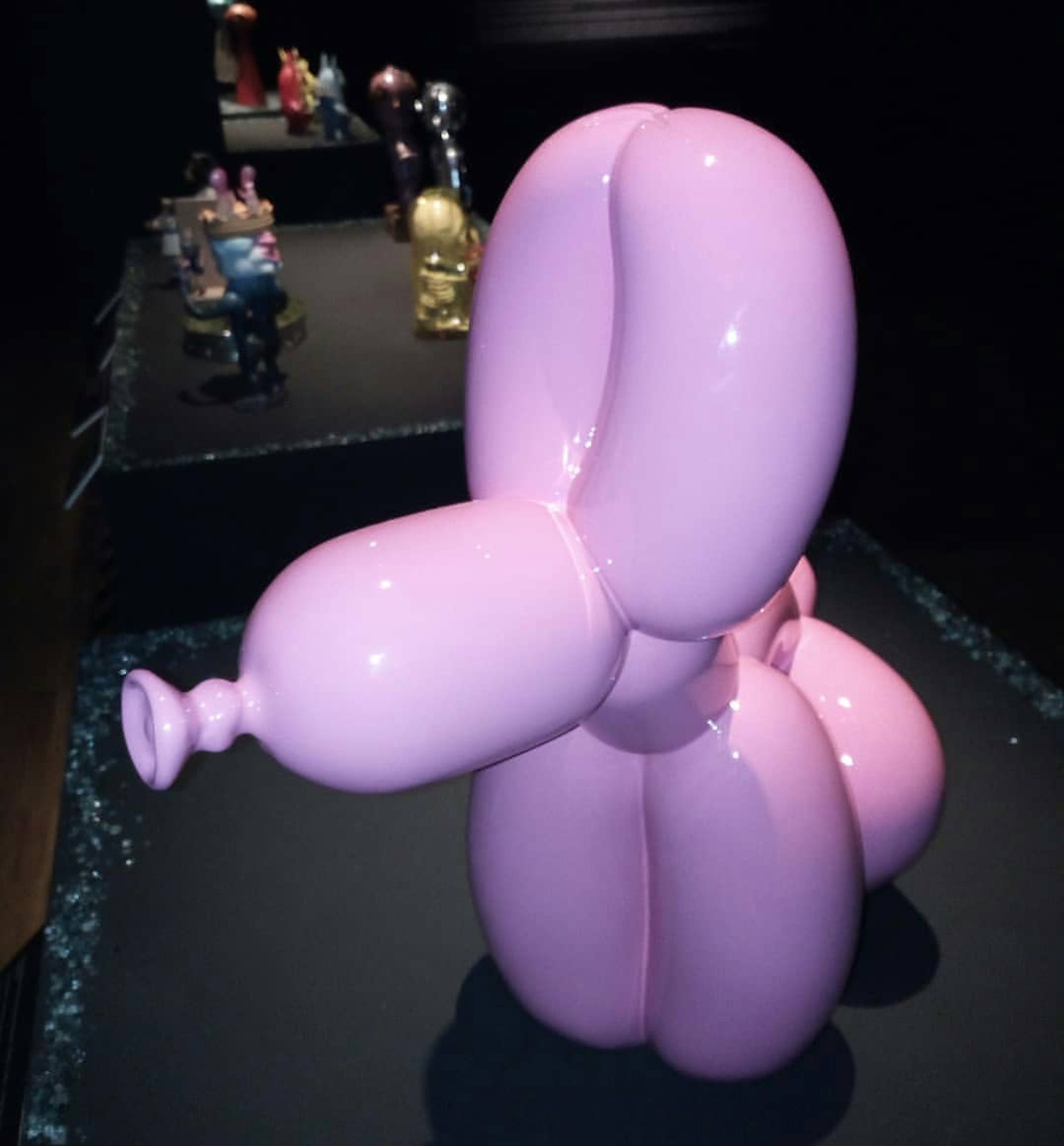 pink dog fiberglass statue