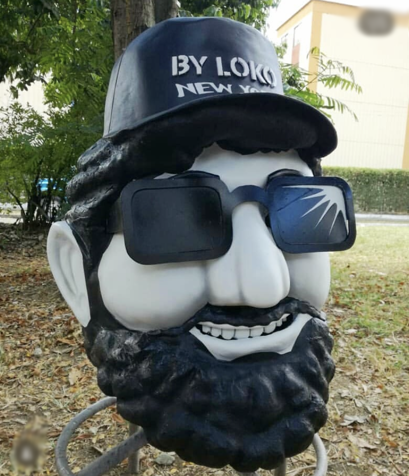 Bearded head sculpture with sunglasses fiberglass