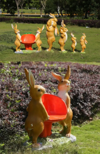 Rabbit Family fiberglass sculpture pull radish lawn decoration chair 1
