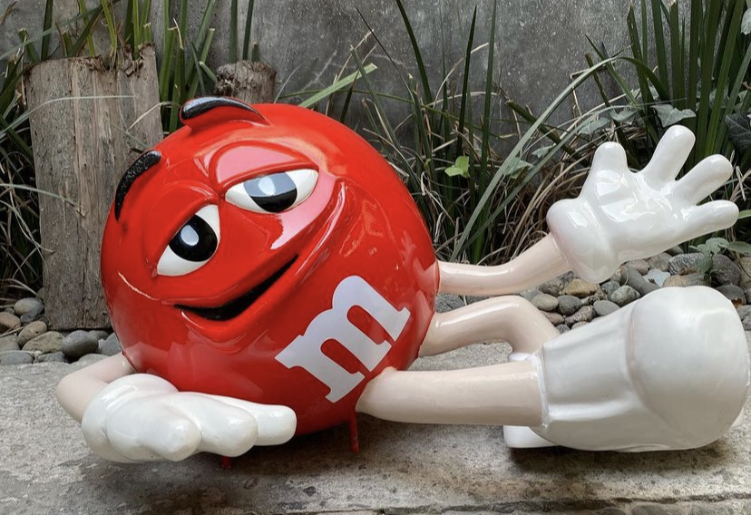 Red life size M&M's character cartoon fiberglass sculpture