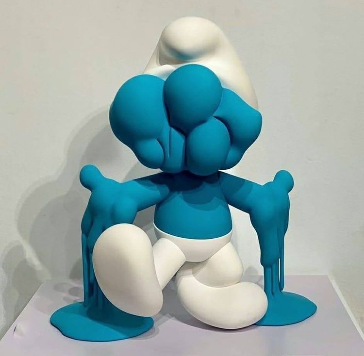 Smurf resin sculpture of 3d creative face and outstretched hand dripping with paint