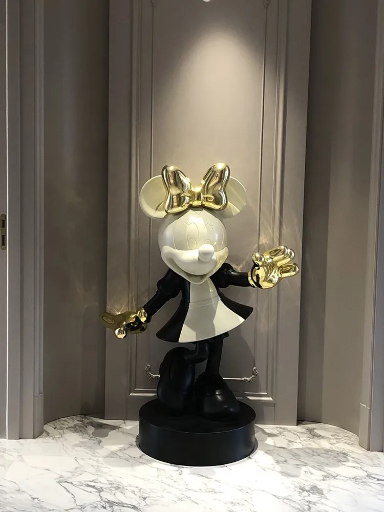 The interior mini fiberglass sculptures are decorated in gold and black and white