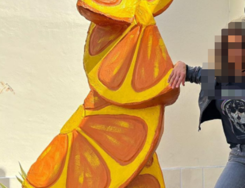 Three-dimensional folded orange fiberglass sculpture outdoor fruit design