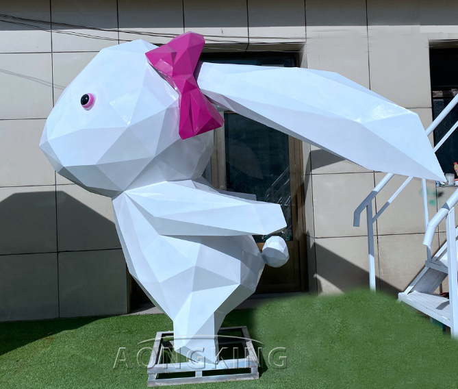Wearing bow geometric rabbit fiberglass sculpture life size animal lawn art