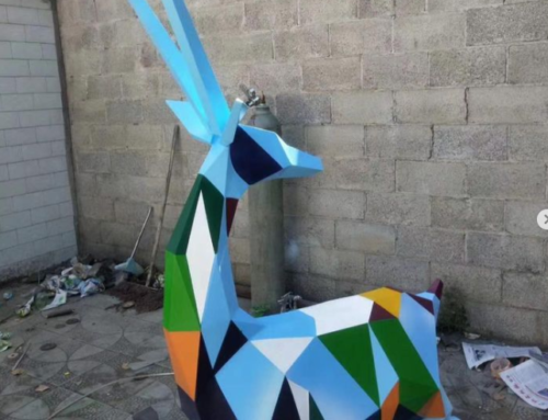 Graceful Resting geometric deer fiberglass sculptures