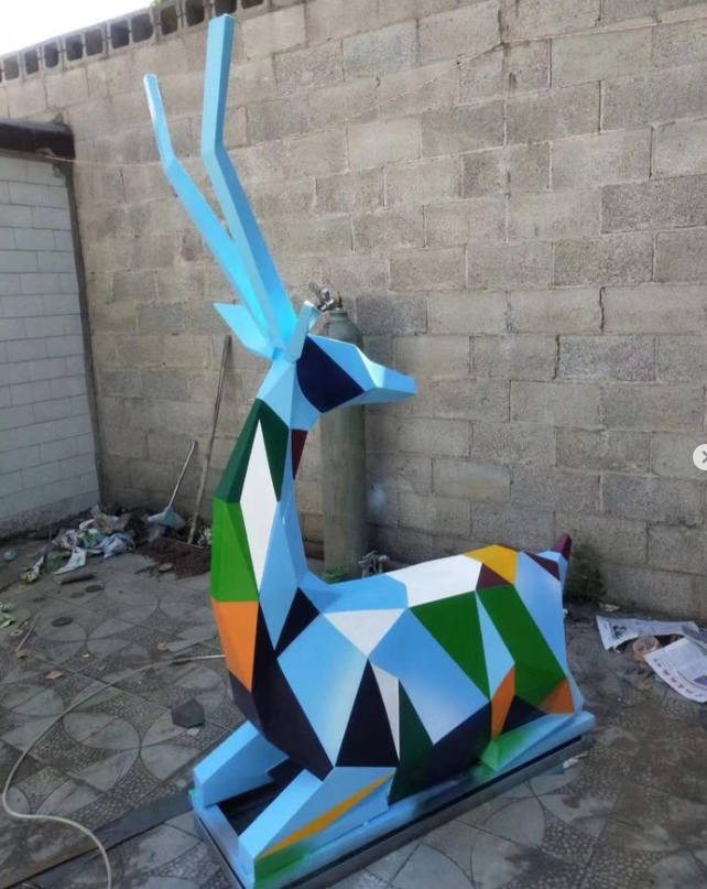 graceful Resting geometric deer fiberglass sculptures